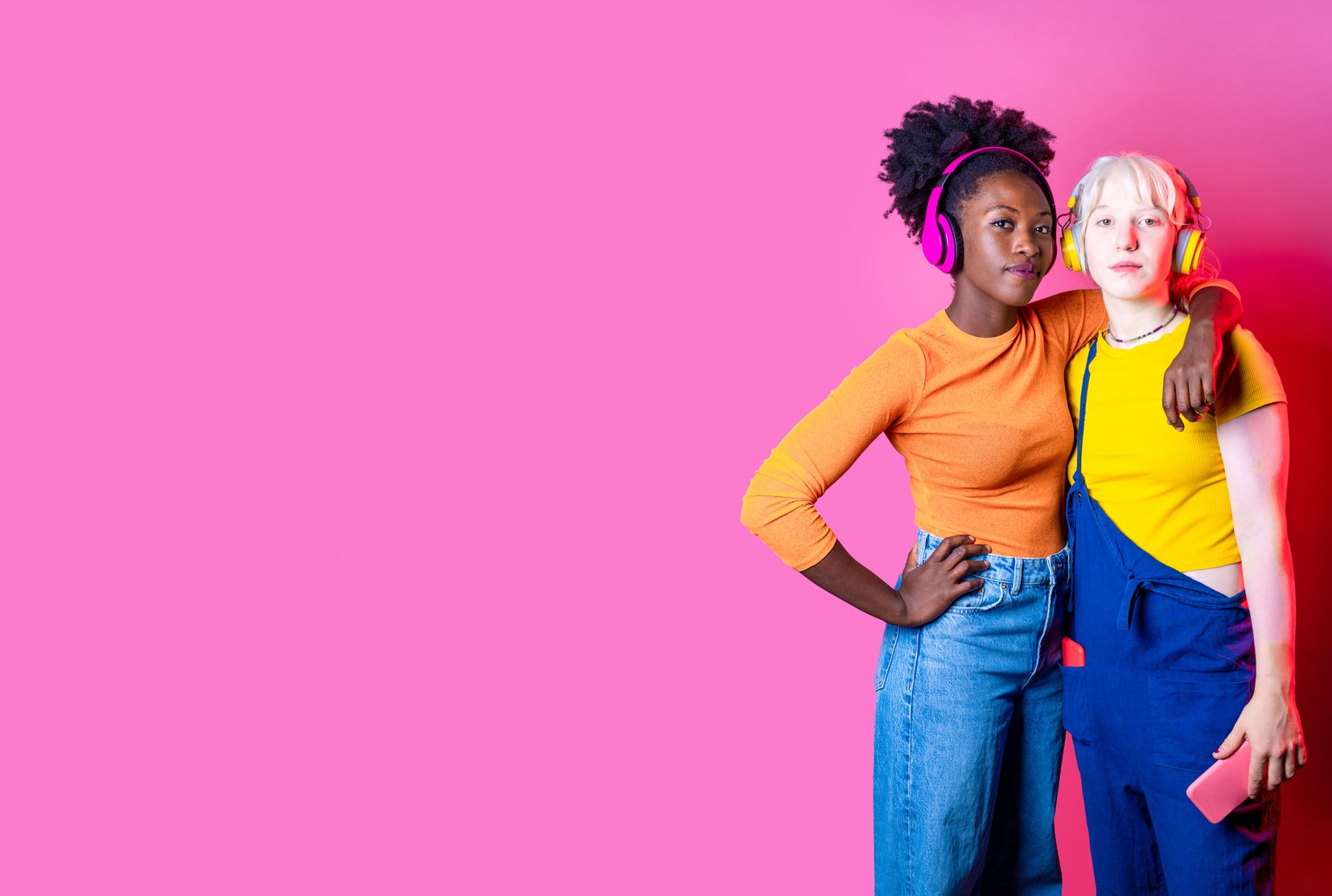 Two Young Diverse Multicultural Women Best Friends Posing Isolat